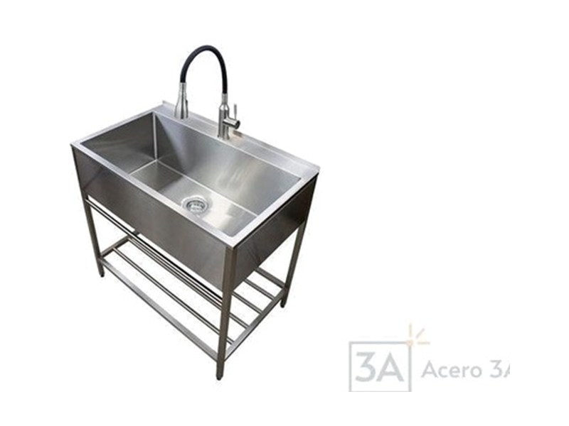 Lavadero con soporte y grifo